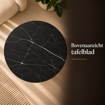 Bovenaanzicht van rond zwart marmerlook tafelblad met fijne witte aders